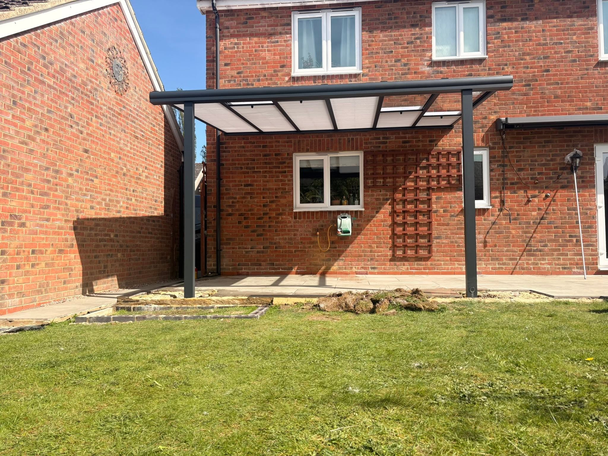 Premium Aluminium Canopy With Blinds installed at a UK home